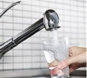 water pouring from faucet