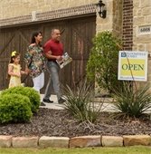 couple walking into open house in Mesquite