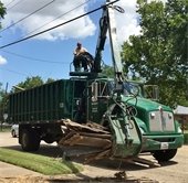 trash can picking up bulk trash