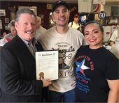 Mesquite BBQ owners pictured with Mayor Pickett