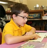 little boy at the library