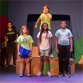 children on stage at missoula camp