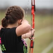 girl doing archery