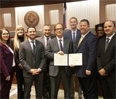City of Mesquite Planning Department picture with Mayor Archer at Council meeting with Excellence in Planning Award