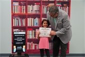 Mayor with reading challenge participant