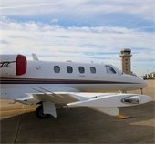 Mesquite Metro airport plane with tower in the background