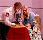 lt jacob heise rings ceremony bell with wife amelia and kids