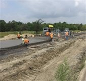 construction workers work on Mesquite street