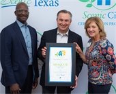 City Manager Cliff Keheley pictured receiving Scenic City award