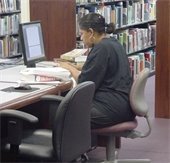 woman uses computer at Mesquite library