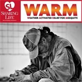 homeless man holding a cup