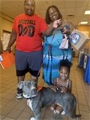picture of dog with new family