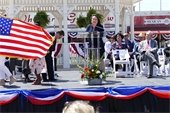 First Lady Cecilia Abbott at podium during downtown celebration