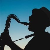 man plays saxophone