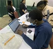 applicants apply for a job at the Mesquite Job Fair