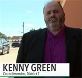 Kenny Green in front of store