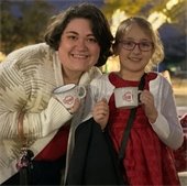 woman and daughter at carols and cocoa