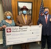 Matchett Brown and Archer at check presentation