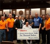 AMBUCS members pictured presenting $10,000 check to City Council 