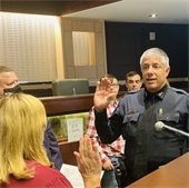 chief david gill being sworn in
