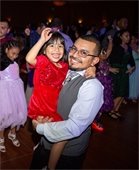 Dad dances with his daughter
