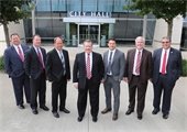 City Council members standing side by side in front of Mesquite City Hall