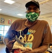 man adopts a dog at clear the shelters event