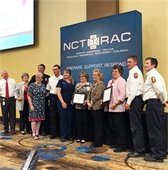 Mesquite organizations posing together with Heart Safe Community award 